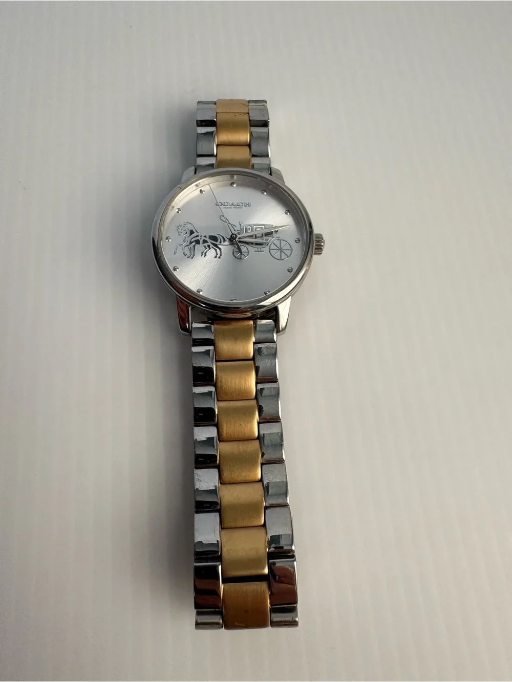 Coach Two-Tone Silver and Gold Horse & Carriage Bracelet Watch